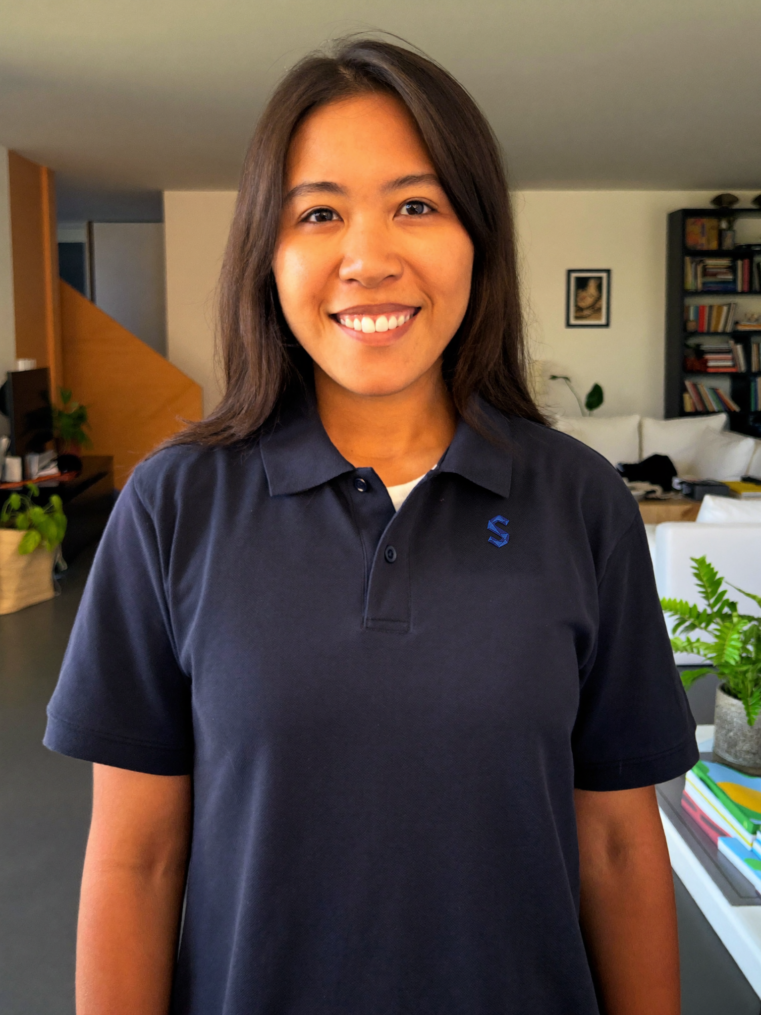 A professional Sapphire Maids domestic helper in a bright Singapore home