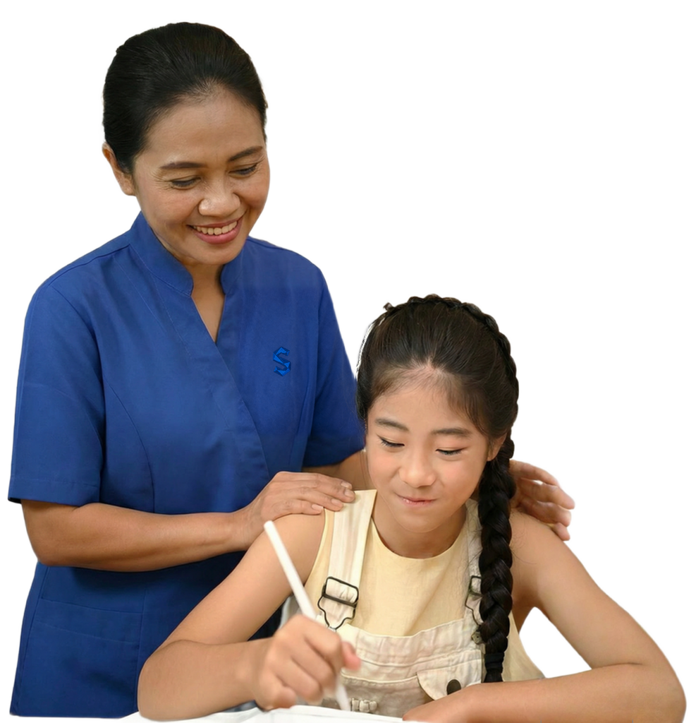 A Sapphire Maids domestic helper helping a child with homework at home
